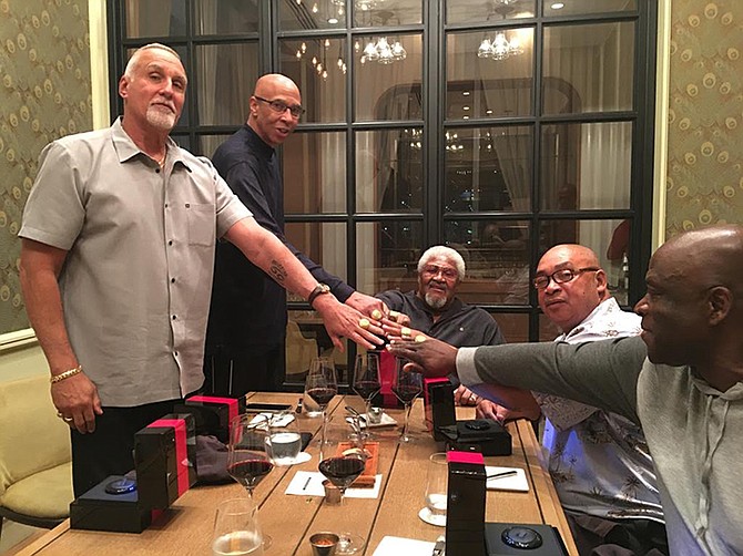 Jackson Five reunited (l-r) Roberto Gonzalez, Mychal Thompson, Coach Jake Caldwell, Osborne Lockhart and Charles Thompson all with their reunion rings.