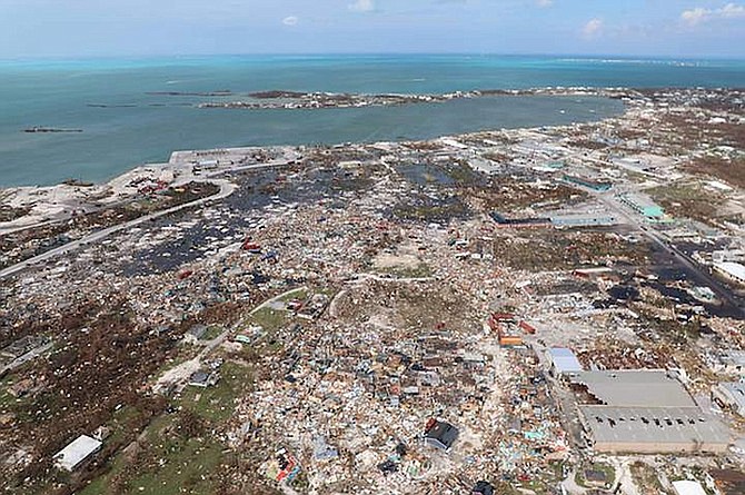 The destruction caused by Hurricane Dorian is seen from the air, in Marsh Harbour, Abaco in September last year. Bahamas First chief executive Patrick Ward said laws making it mandatory for all business and residential property owners to have full catastrophic insurance cover "must be on the table for discussion".
(AP Photo/Gonzalo Gaudenzi)