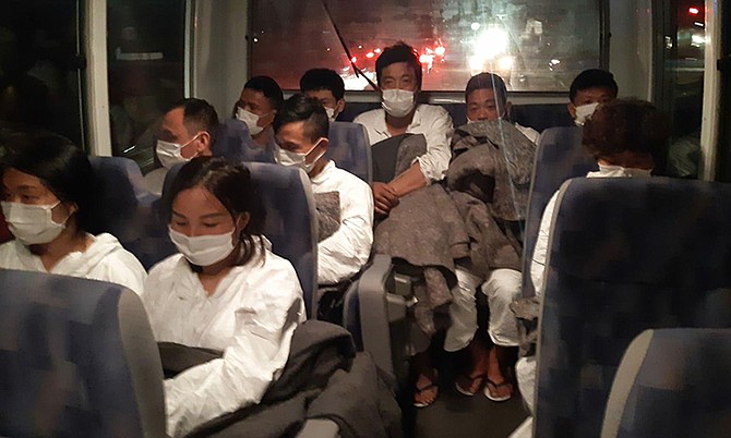 The 10 Chinese immigrants after being intercepted by the US Coast Guard.