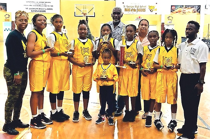 Temple Christian Suns with their primary girls' championship trophies.