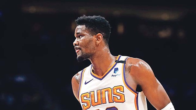 Suns centre Deandre Ayton in action during the first half of a game on February 5 in Detroit. A nagging ankle injury will keep him sidelined during NBA All-Star weekend.

(AP Photo/Carlos Osorio)