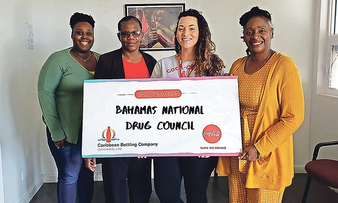 Gabriella Suighi, CBC communications marketing manager, with Bahamas Drug Council representatives.