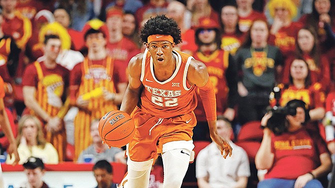 Texas forward Kai Jones drives up court during the second half of an NCAA college basketball game against Iowa State, Saturday, Feb. 15, 2020, in Ames, Iowa.

(AP Photo/Charlie Neibergall)