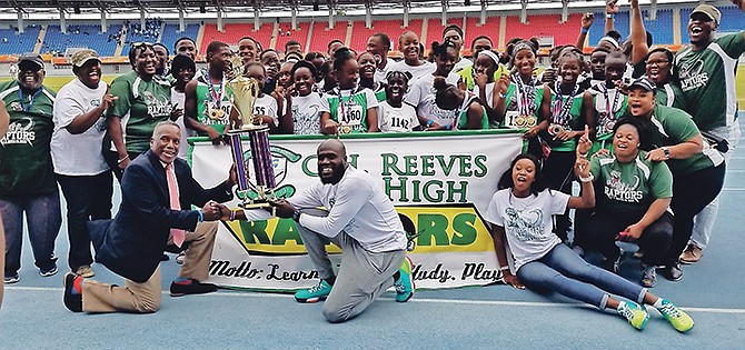 CH Reeves Raptors celebrate with their championship trophy.