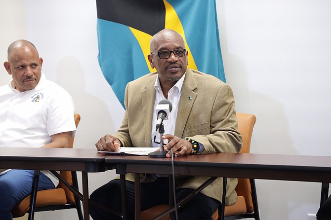 Prime Minister Dr Hubert Minnis and Heath Minister Dr Duane Sands (left).