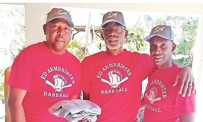 Sponsor Ivan 'Showtime' Francis shares a moment with patron Ed Armbrister and co-ordinator Michael Butler of the Ed Armbrister Baseball League.