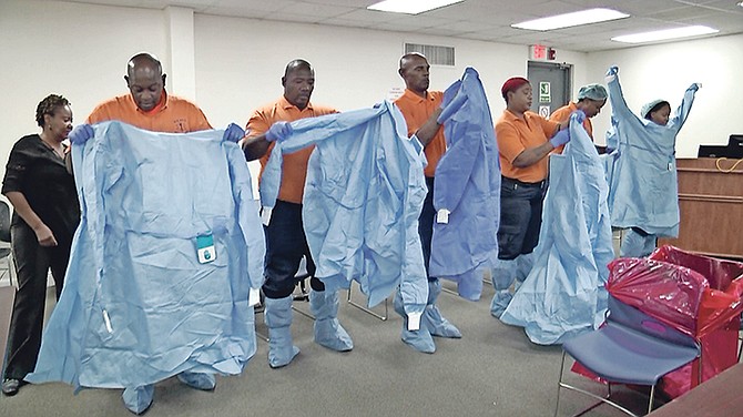 National Emergency Medical Services (NEMS) staff begin Personal Protective Equipment (PPE) training this week at the Public Hospitals Authority’s Training Centre as a part of the Ministry of Health and Public Hospitals Authority’s countrywide readiness campaign ahead of any possible threat of Coronavirus. The training prepares emergency medical technicians and paramedics to safely deal with a potential coronavirus case.