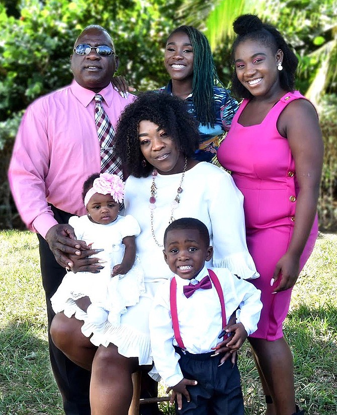 Tyrone Johnson pastor, youth counsellor, drug prevention educator, and advocate for persons with disabilities with his wife Larisa, daughters Chelsea and Ashley, and grandchildren.