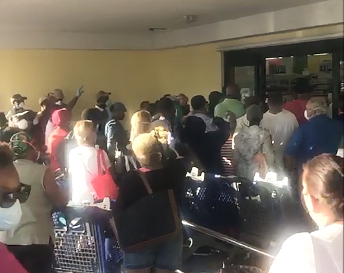 A still from a video showing crowds outside a supermarket on Tuesday.