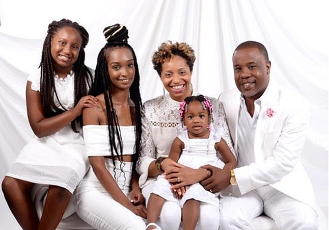 Clair with her husband Matthew Minson and their daughters Maya, Sarah and Madison.