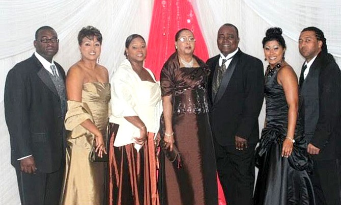 Rev and Mrs Moss, centre, with children (left to right) D’Angelo, Carla, Carolyn, Crystal and Carlton.