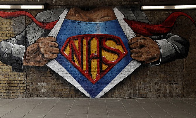 An NHS Superman design mural in London by street artist Lionel Stanhope.