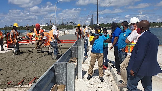 MINISTER of State for Disaster Preparedness, Management and Reconstruction Iram Lewis (left) explains to Deputy Prime Minister Peter Turnquest, and Minister of State for Grand Bahama, Kwasi Thompson some of the work being carried on Fishing Hole Bridge. Photo: Lisa Davis/BIS