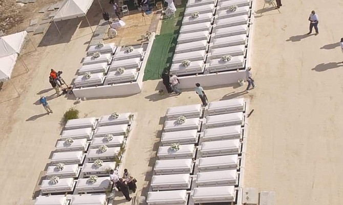 The mass burial of 55 Hurricane Dorian victims in Abaco.