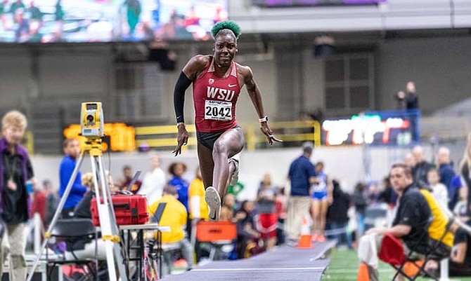 CHARISMA TAYLOR, in action above in the triple jump, is looking to become one of the next Bahamian Olympians.