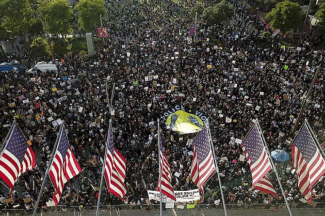 Demonstrators protesting in Los Angeles on Wednesday. (AP Photo/Ringo H.W. Chiu)