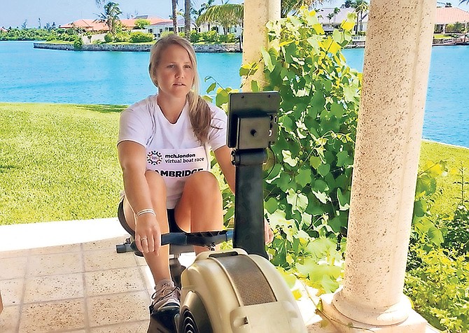 Sophie Paine rowing to practice for her fundraising effort.