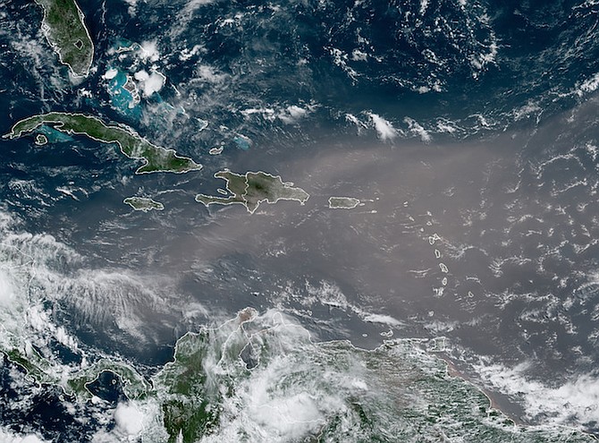 This satellite photo from Monday, provided by the National Oceanic and Atmospheric Administration, NOAA, shows a cloud of dust coming from the Sahara desert. (NOAA via AP)