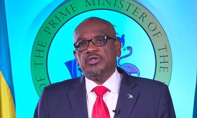 Prime Minister Dr Hubert Minnis delivers his address on Sunday.