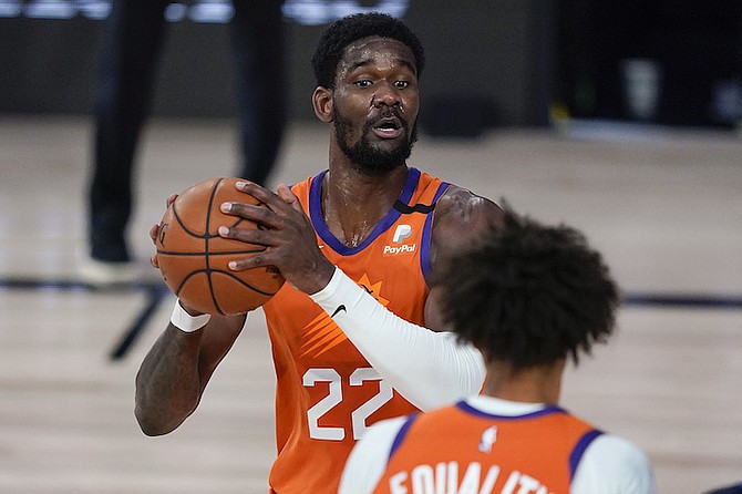 Phoenix Suns centre Deandre Ayton (22) looks to pass against the Dallas Mavericks during the second half on Sunday. (AP Photo/Ashley Landis, Pool)