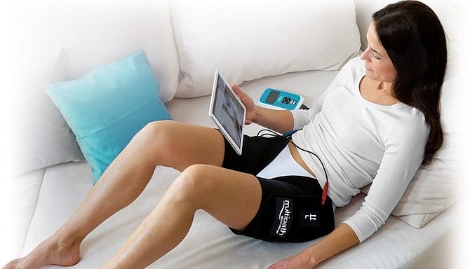 A woman uses the new INNOVO device.