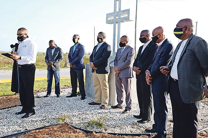 A MEMORIAL ceremony was held at the Sir Jack Hayward Bridge yesterday, attended by officials including Deputy Prime Minister Peter Turnquest; Minister of Agriculture and Marine Resources Michael Pintard; Minister of State for Grand Bahama Kwasi Thompson; Minister of State for Disaster Preparedness, Management and Reconstruction Iram Lewis and Senator Jasmine Darius, along with a members of the clergy and President of the Grand Bahama Port Authority Ian Rolle. 
Photos: Lisa Davis/BIS