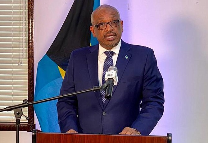 Prime Minister Dr Hubert Minnis speaking in Grand Bahama on Monday.