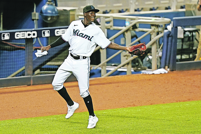 Miami Marlins infielder Jazz Chisholm is shown during the eighth inning of a baseball game against the Toronto Blue Jays on September 1 in Miami. Chisholm had his first major league home run, RBI, triple and multi hit game in the Marlins 29-9 loss to the Atlanta Braves last night.
                                                                                                                (AP Photo/Wilfredo Lee)