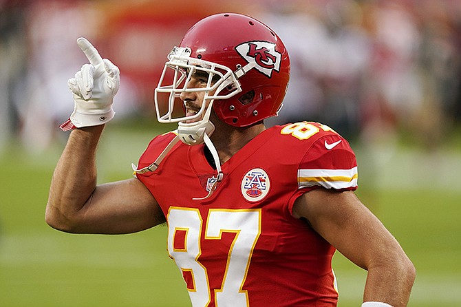 Kansas City Chiefs tight end Travis Kelce warms up before an NFL football game against the Houston Texans yesterday.