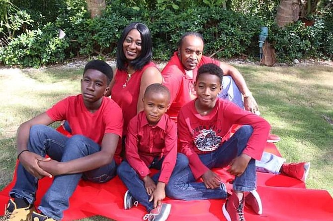 KENNETH and Margarita Wilson with their family.