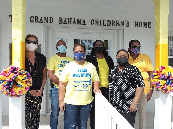 From left, Sarah Kirkby, board member of Grand Bahama Children’s Home; Darren Cooper, assistant area governor of Rotary District 6990; Billy Jean Ferguson, area assistant governor District 6990; attorneys Hadassah Swain and Jethlyn Burrows of FIDA, and Sheila Johnson-Smith, executive director of GB Children’s Home. Photo: Denise Maycock