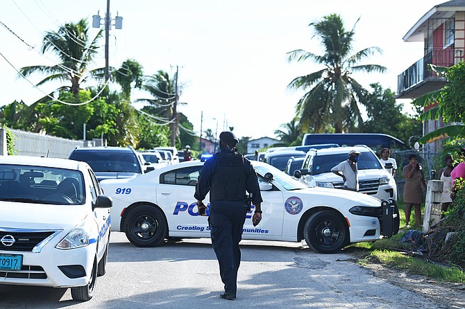 Police at the scene in Nassau Village on Monday morning. Photo: Shawn Hanna/Tribune staff