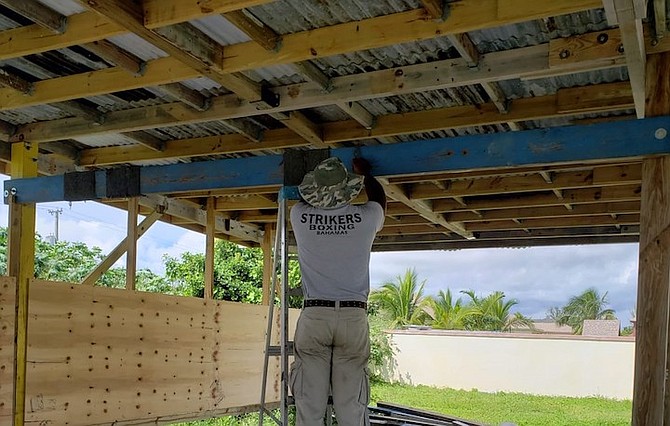 RONN Rodgers putting the finishing touches to his new gym.