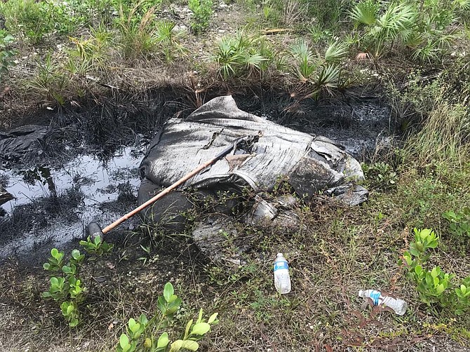 SOME of the oil dumped in Grand Bahama.