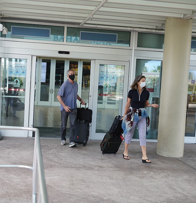 SOME of the first arrivals at Lynden Pindling International Airport after the country reopened to
tourists. Photo: Terrel W Carey Sr/Tribune Staff