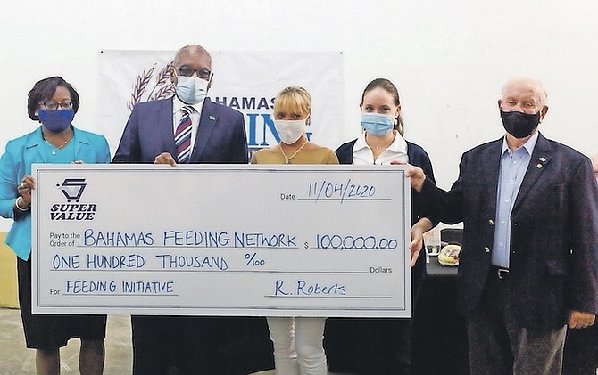THE PRESENTATION of $100,000 to the Bahamas Feeding Network. Photo: Donovan McIntosh