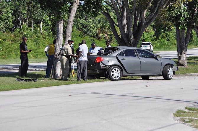 Police at the scene of the accident on Sunday. Photo: Vandyke Hepburn