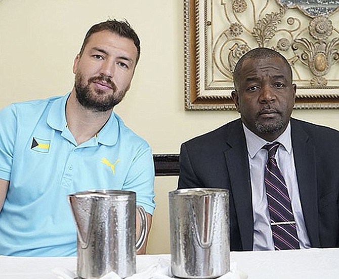 CHRIS DEMARCO, left, head coach of our men’s national basketball team, and Mario Bowleg, president of the Bahamas Basketball Federation.