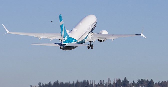 A BOEING 737 MAX taking off.