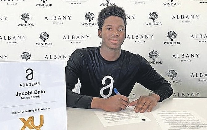 JACOBI BAIN, of the Bahamas, has signed his official letters to attend Xavier University of Louisiana.