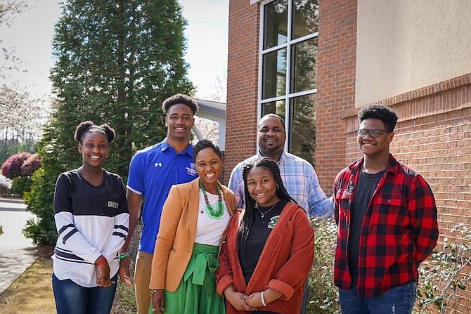 JORDAN STRACHAN, flanked by sister Amorie Strachan, mother Shuntay Strachan, sister Chelsea Strachan, father Sean Strachan and brother Christop.