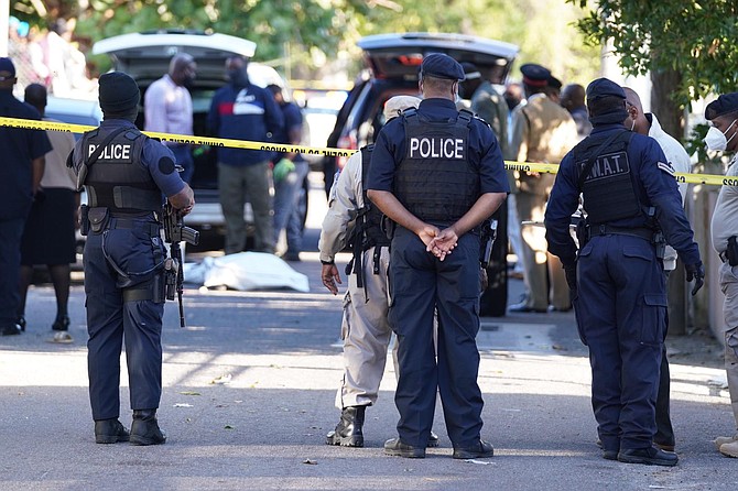 Police at the scene on Pitt Road on Wednesday morning. Photos: Terrell W Carey Sr/Tribune staff