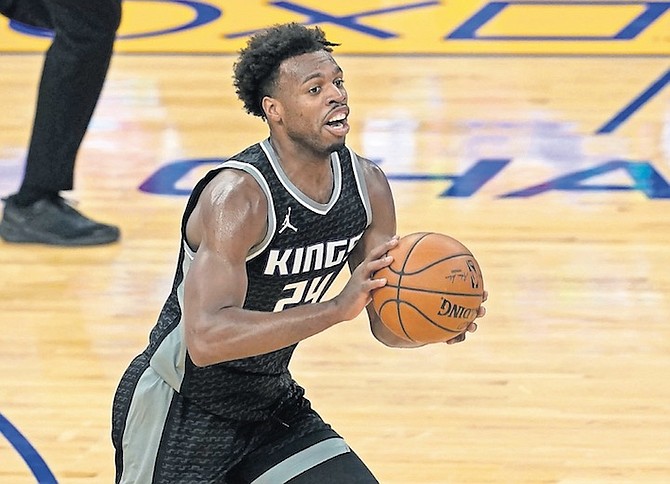 SACRAMENTO Kings guard Chavano “Buddy” Hield in action against the Golden State Warriors in San Francisco on Monday night. Last night against the Bulls, he scored 10 points with three rebounds, three assists and a steal in 35 minutes. (AP Photo/Jeff Chiu)