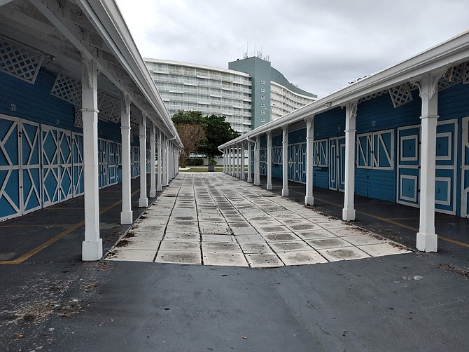 The closed straw market at Port Lucaya Marketplace with the closed Grand Lucayan Resort in the background.