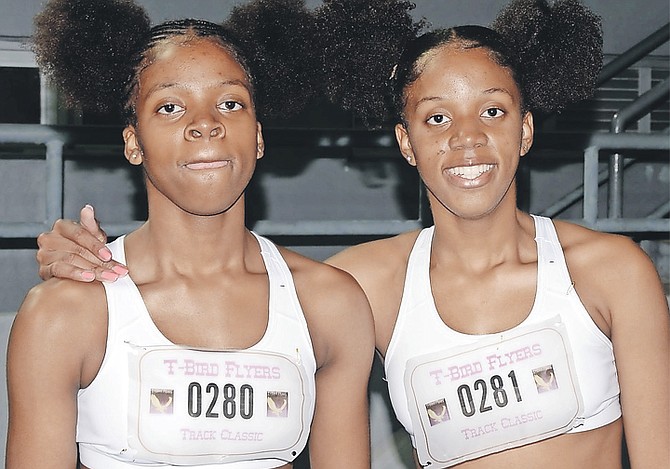 SISTERS Kaiya and Keanna Cambridge during the T-Bird Flyers Track Classic at the Thomas A
Robinson National Stadium on Saturday.