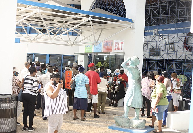 PENSIONERS gathered outside NIB as they attempted to verify their benefits earlier this month. 
Photo: Donovan McIntosh/Tribune Staff