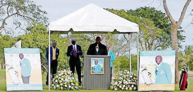 Pro golfer Keno Turnquest makes his remarks Saturday as fellow golfers and friends gathered at the Bahamas Golf Federation’s Driving Range at the Baillou Hills Sporting Complex to pay their last respects to the late pro golfer and instructor James ‘Jungle Jim’ Duncombe.