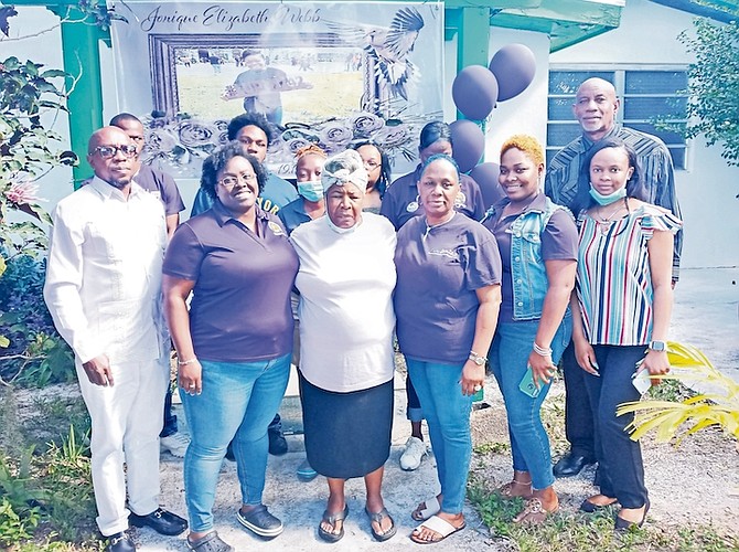 FAMILY and friends of the late Jonique ‘Mini’ Webb can be seen at her memorial yesterday.
