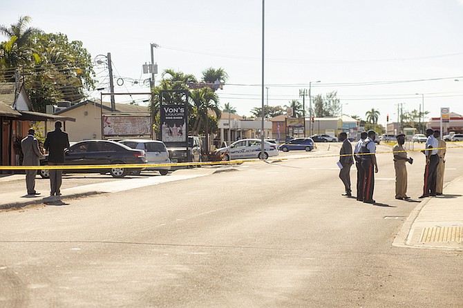 Police at the scene of the shooting on Village Road. Photo: Donavan McIntosh