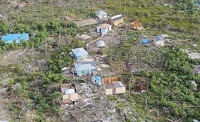 ONE of the issues residents are concerned about is new construction of shanty homes in the Farm Road area - pictured here last year.